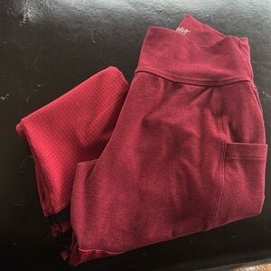 Med Bombshell Red and black legging. Great condition.